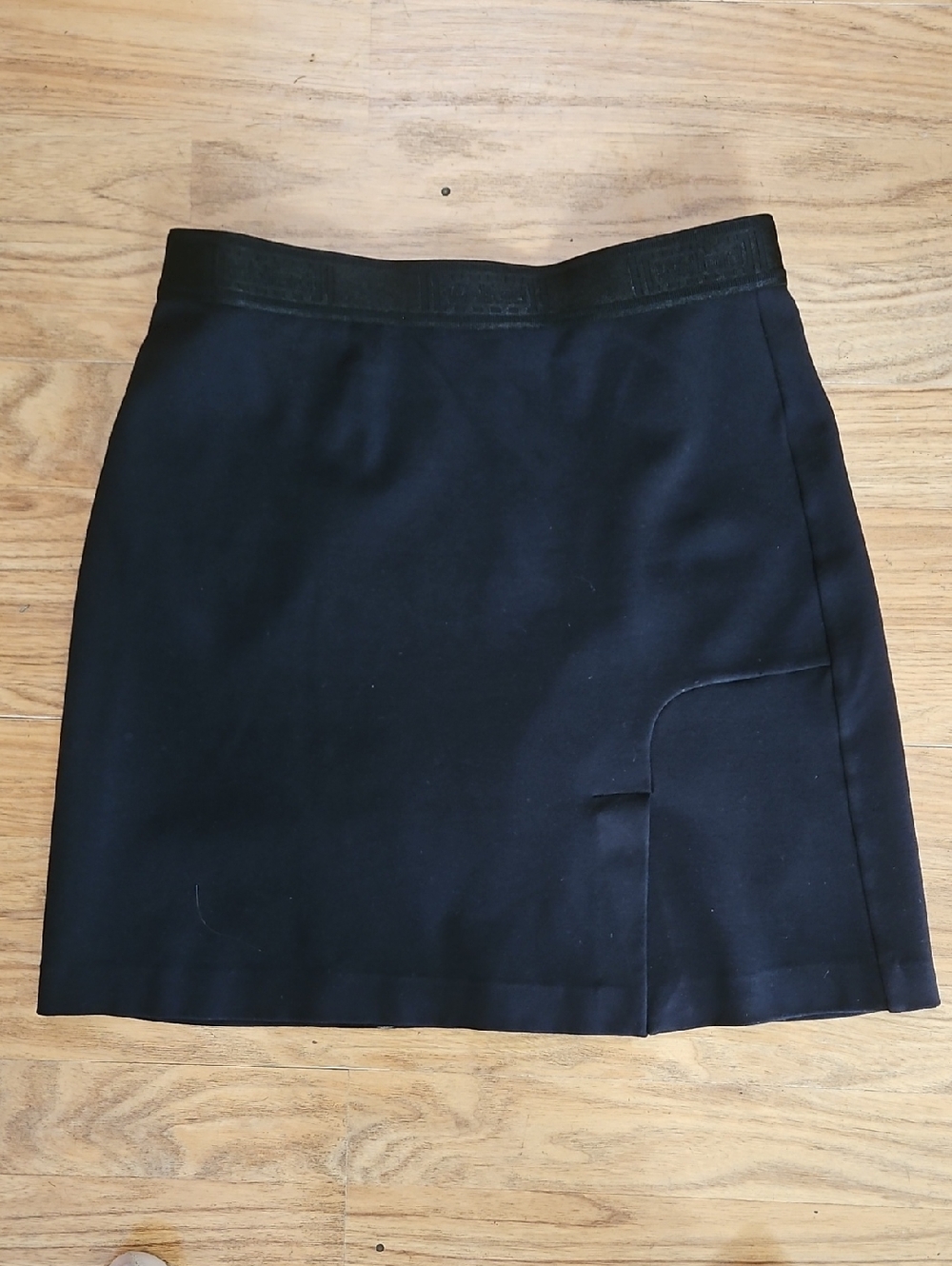 Wolford Black Fitted Mini Skirt with Subtle Paneling